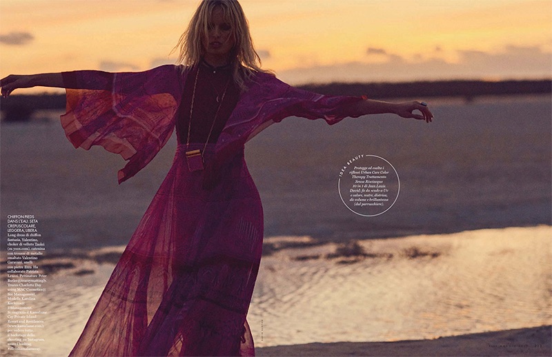 Looking bohemian chic, Karolina Kurkova poses in Valentino maxi dress and necklace