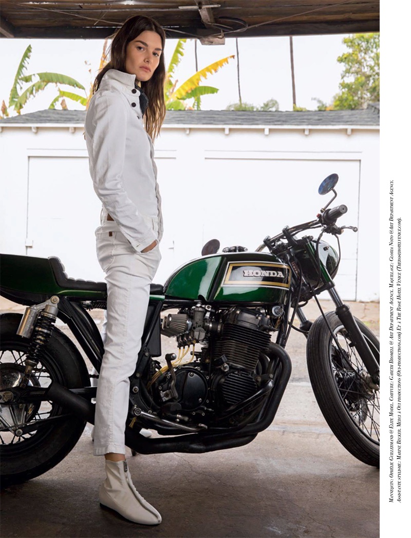 Wearing white, Ophelie Guillermand wears Le Temps des Cerises jacket and pants with Stella Luna boots