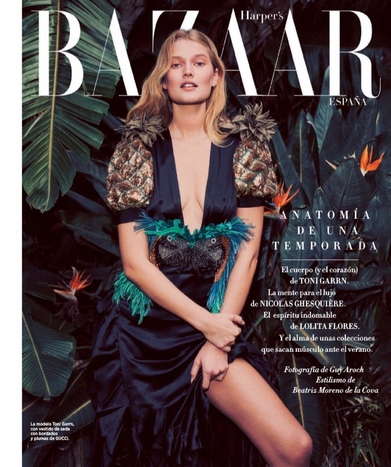 Flaunting some leg, Toni Garrn wears Gucci dress with sequins and feathers