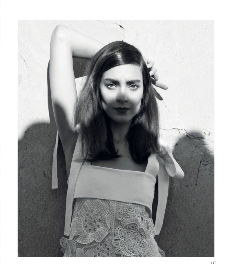 Photographed in black and white, Kati Nescher models Chloe floral appliqué dress