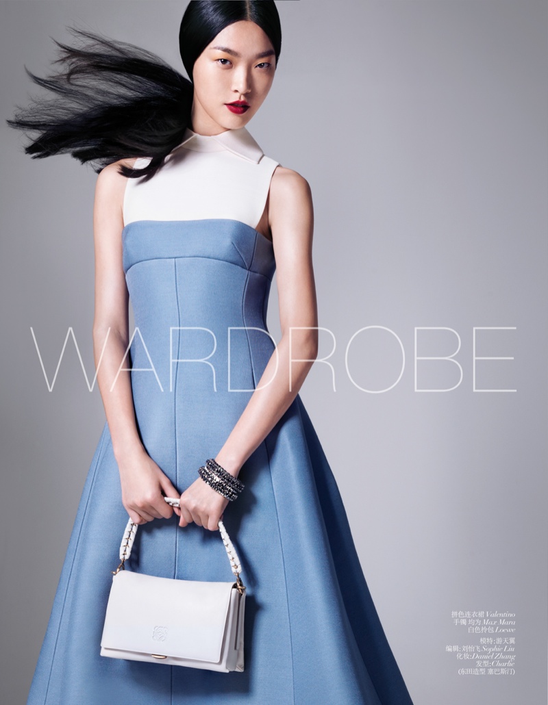 Tian Yi Wears New Season Fashions for Vogue China by Stockton Johnson