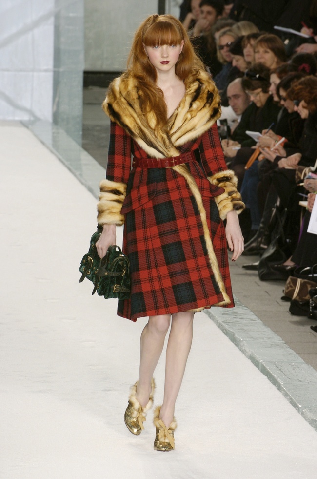 A model wears a creation by American fashion designer Marc Jacobs for Louis Vuitton  Fall-Winter 2005-2006 ready-to-wear collection presentation in Paris,  France, on March 6, 2005. Photo by Java/ABACA Stock Photo 