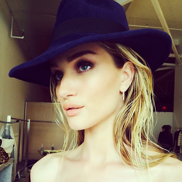 Rosie Huntington-Whiteley shared an image of herself wearing a fedora in 2014. Photo via Instagram. 