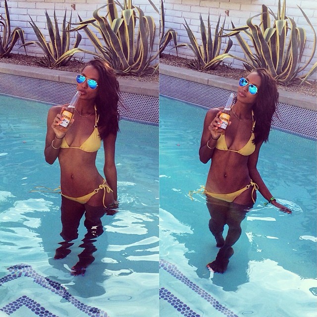 Jasmine Tookes wears a yellow bikini