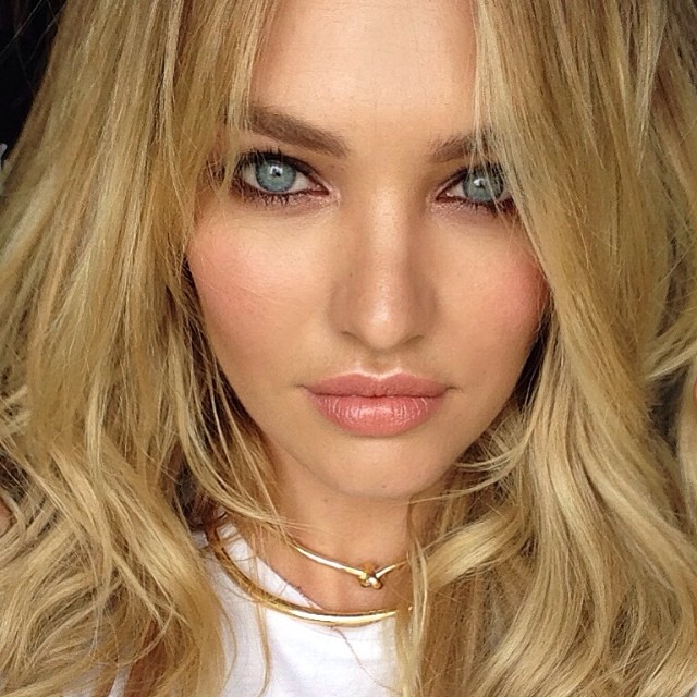 Close up of Candice Swanepoel on set