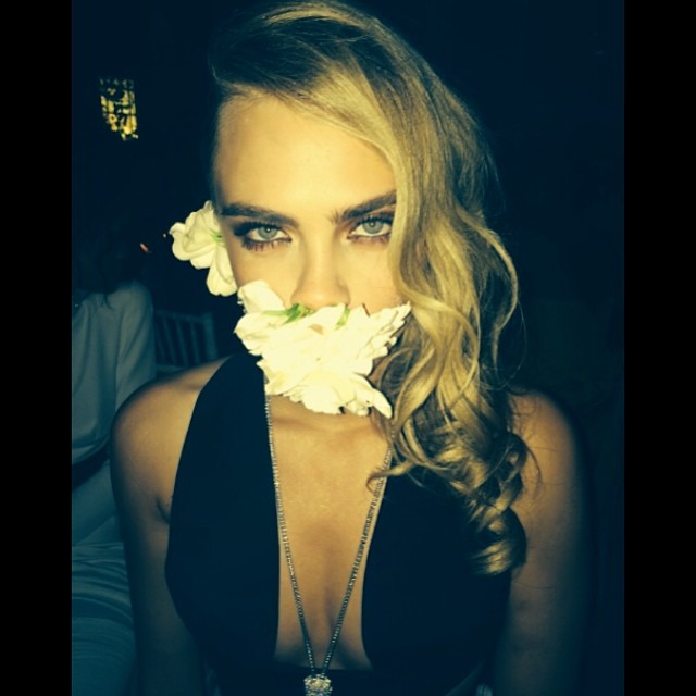 Cara Delevingne shows off flowers in an unusual way
