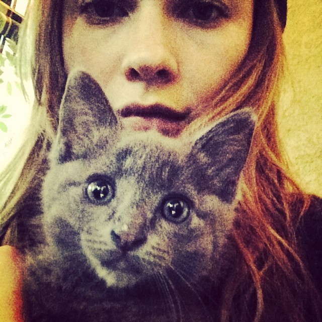 Behati Prinsloo takes a selfie with her cat