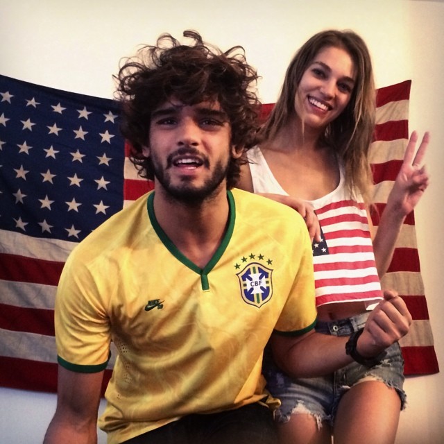 Samantha Gradoville posed with male model Marlon Teixeira with two American flags