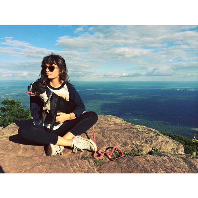 Alyssa Miller poses on a mountain