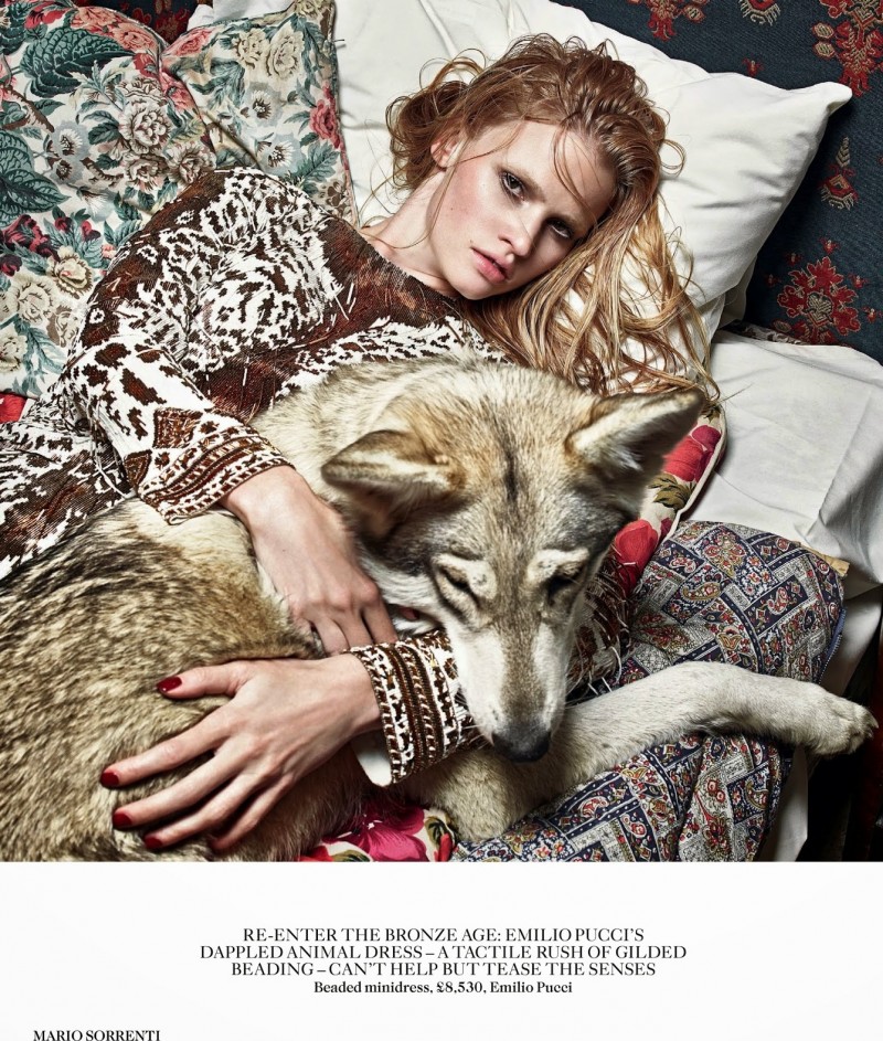 Lara Stone with Wolf in Vogue UK August Issue by Mario Sorrenti