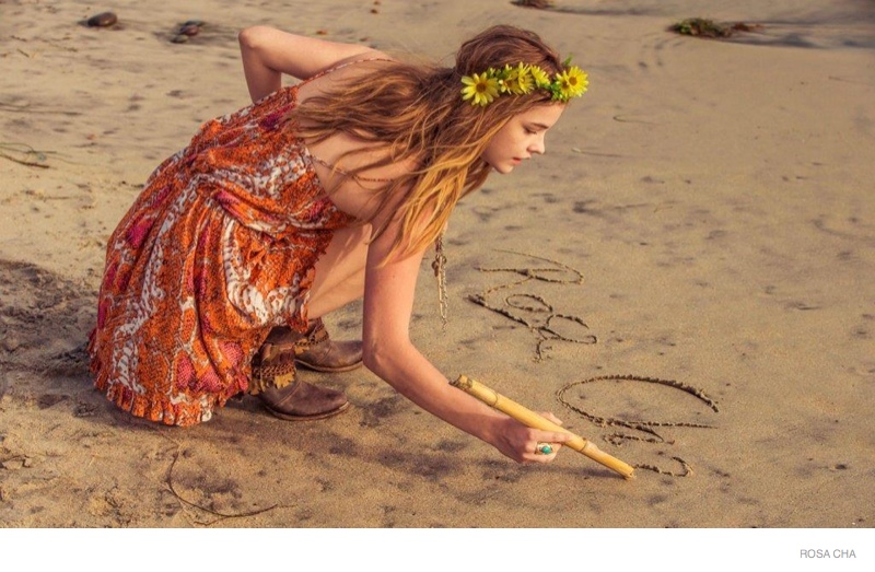 A flower crown and breezy dress channel the essence of summer.