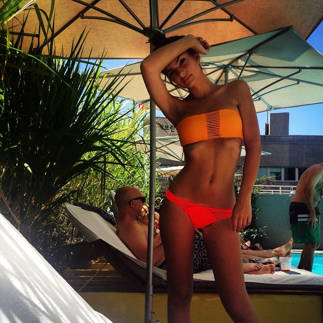 Emily Ratajkowski rocks orange bikini