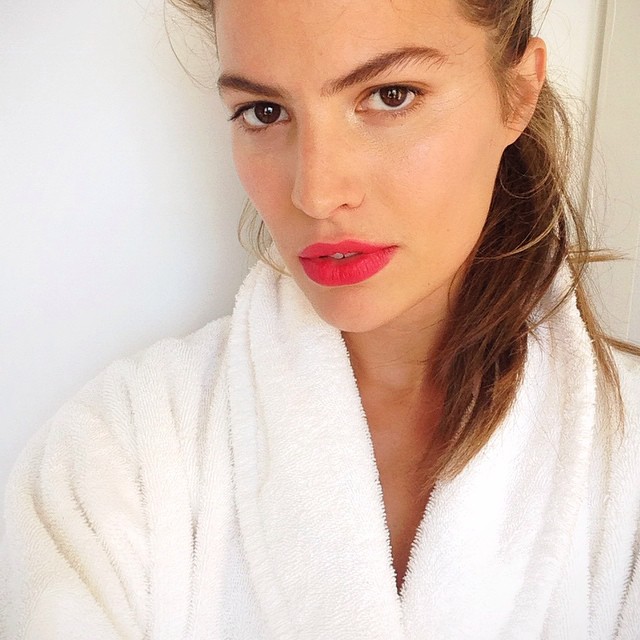 Cameron Russell in a red hot lip color