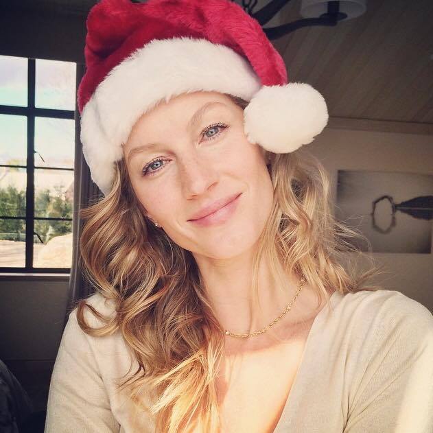 Gisele Bundchen is gorgeous in a Santa hat