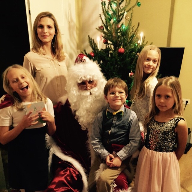 Karlina Caune with Santa and her family