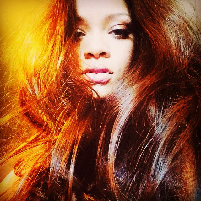 ANOTHER LOOK: In another photo, Rihanna put a filter on the image, giving her hair a reddish undertone. 