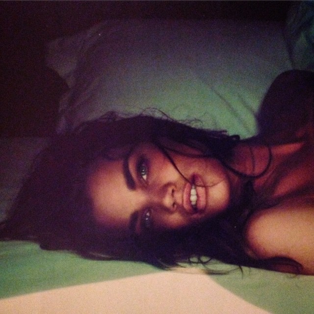 Rianne ten Haken takes a photo in bed