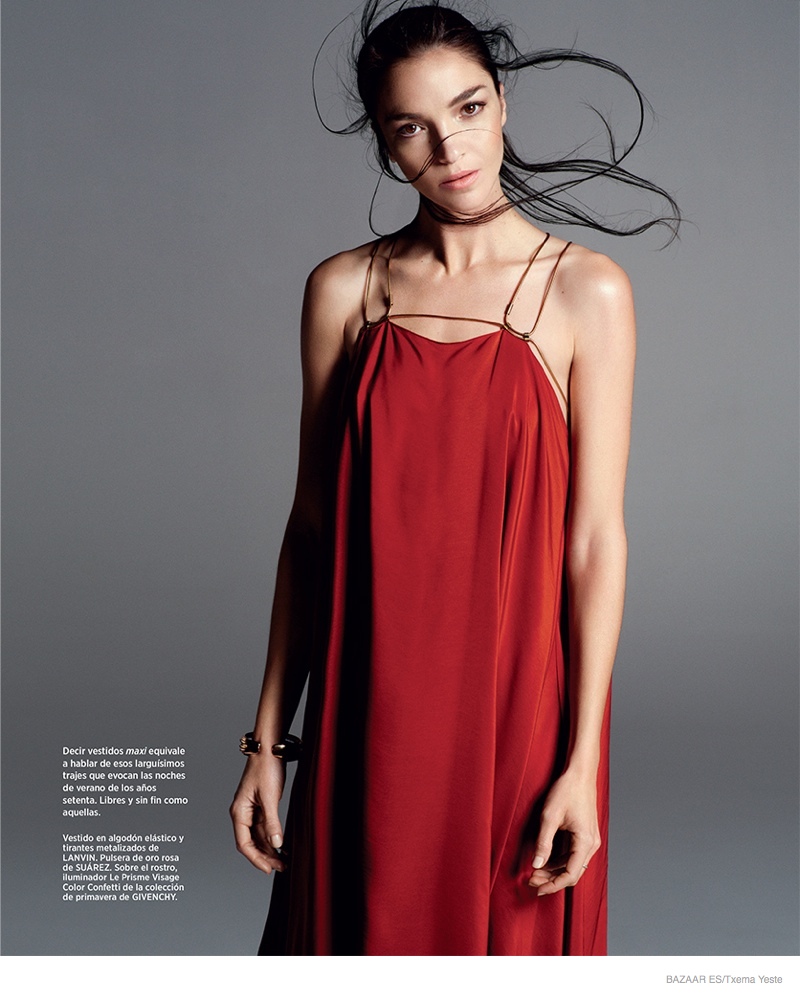 A Lanvin red dress makes a second appearance for the magazine's inside pages. 