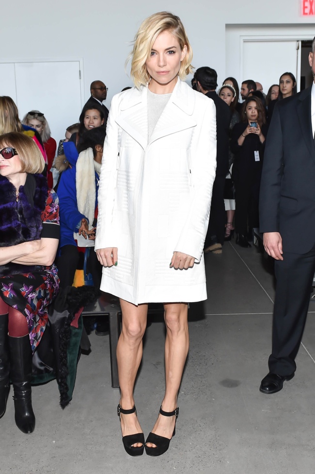 Sienna Miller Wears Calvin Klein Collection Leather Jacket + Knit Dress at NYFW