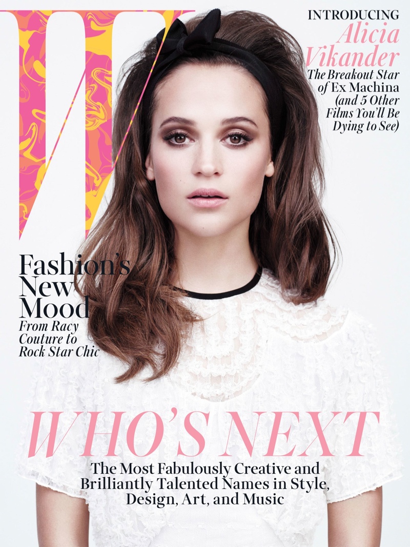Alicia Vikander stars on the April 2015 cover of W Magazine wearing a Louis Vuitton white dress. 