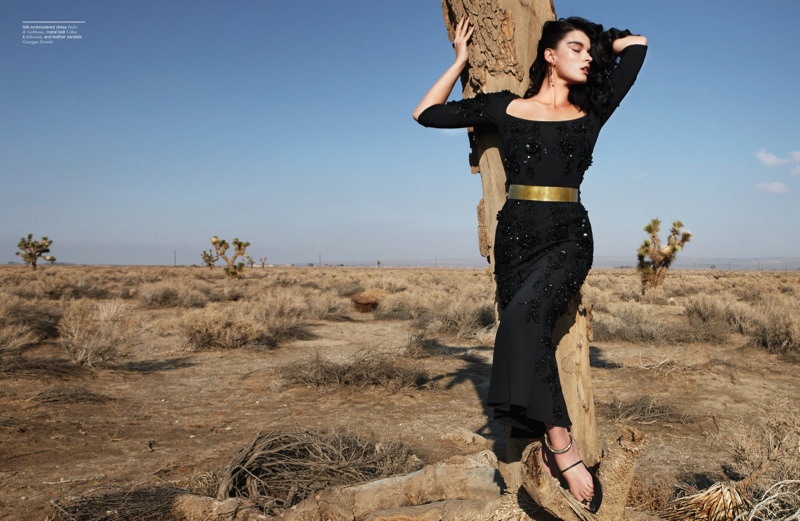 Crystal models a black dress from Dolce & Gabbana