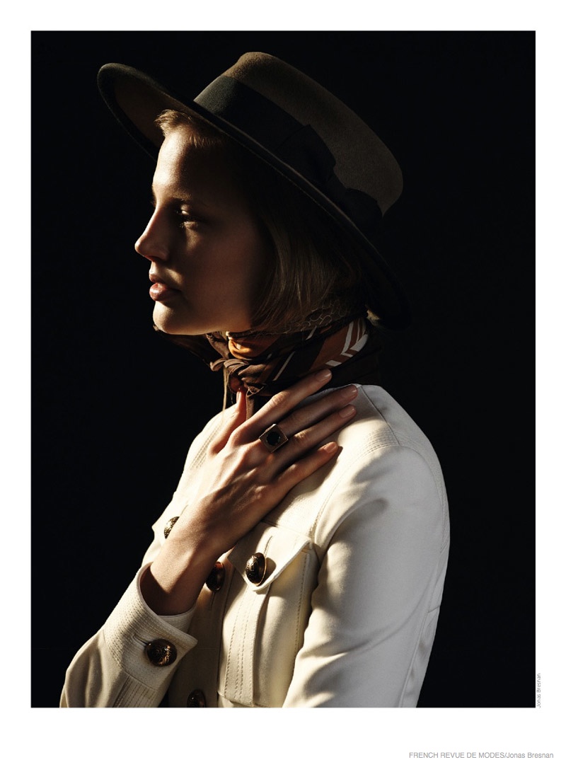 A utilitarian inspired dress and masculine hat make a bold statement.