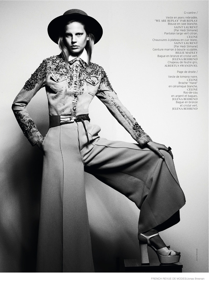 An embellished top, wide-brimmed hat and flared pants stand out.