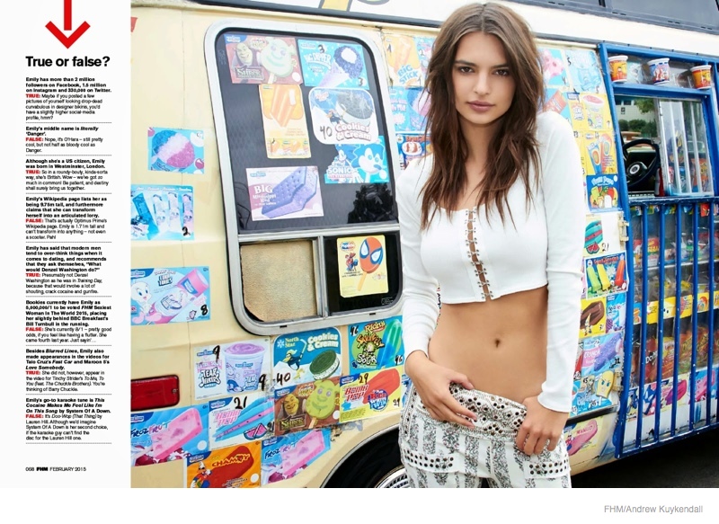 Wearing a sexy crop top look, Emily poses in front of an ice cream truck.