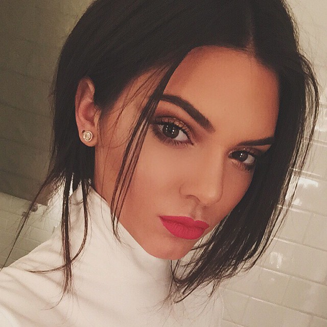 Kendall Jenner shows off a red lipstick look on Instagram.