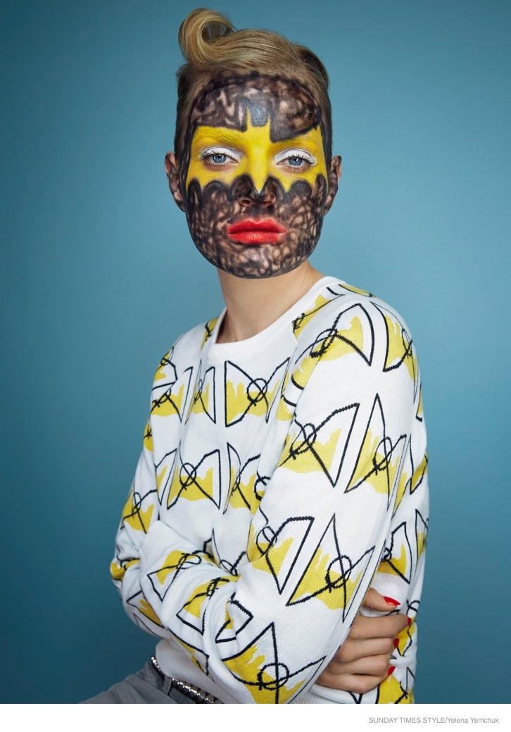 Yelena Yemchuck photographed the model in bold face paint makeup. 