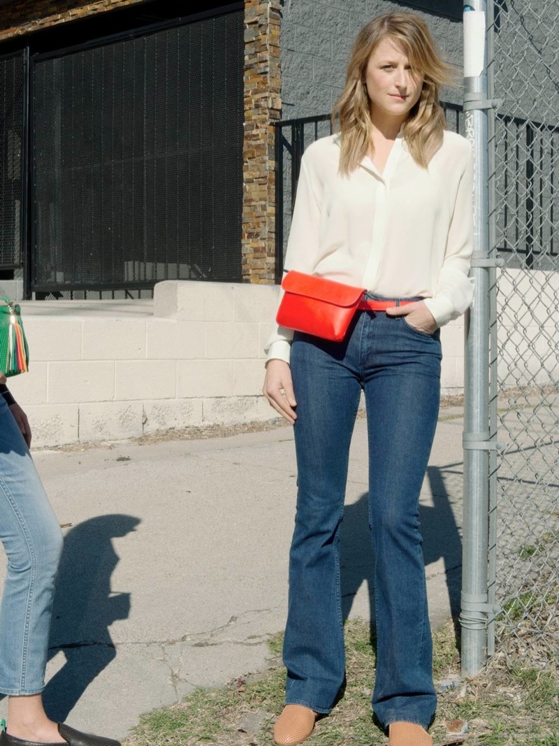 Mamie Gummer wears t-shirt, jeans and a red bag in & Other Stories advertisement. 