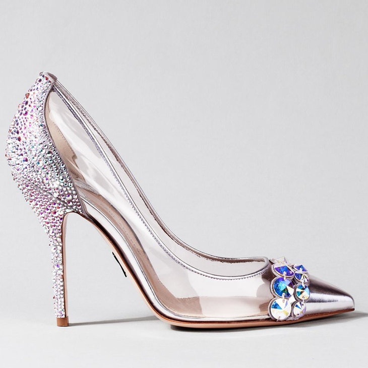 Designer Paul Andrew said that “Cinderella’s glass slipper represents every woman’s dream shoe,” and he created a transparent PVC look for a glass effect paired with ivory suede and hand encrusted Swarovski crystals. 