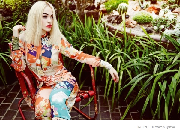 Rita wears funky floral prints for the fashion feature. 