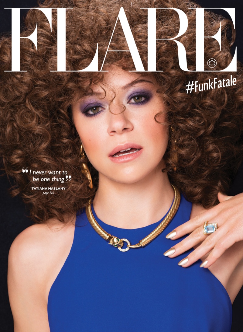 Wearing a Roberto Cavalli Dress, Tatiana gets funky with a curly coif. 