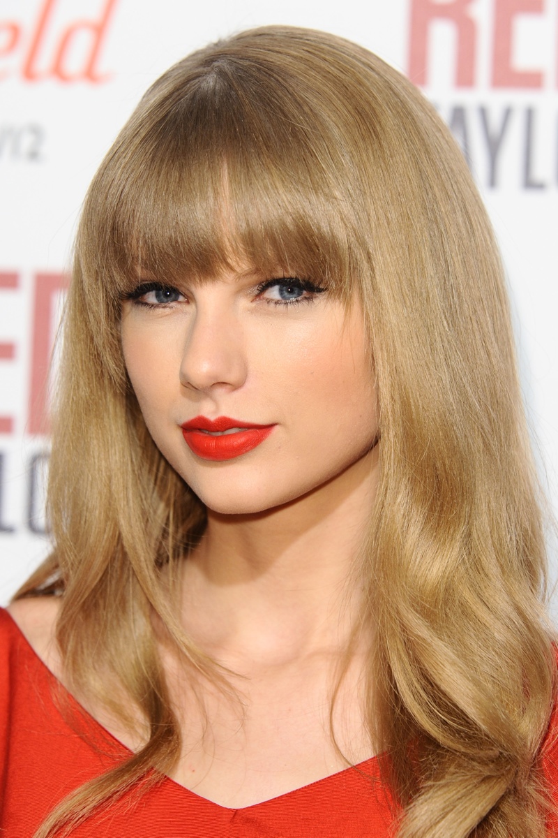 Taylor Swift in London in 2012 with a pouty red lip. Photo: Featureflash/Shutterstock.com