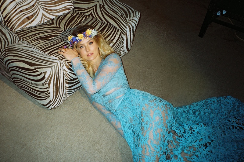 Bar models an Elie Saab dress and flower crown in this image