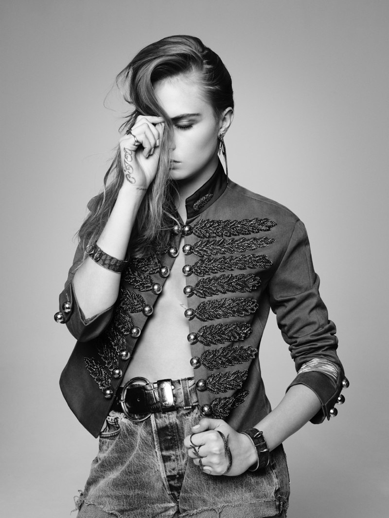 Cara rocks a military inspired jacket and denim for the photo shoot