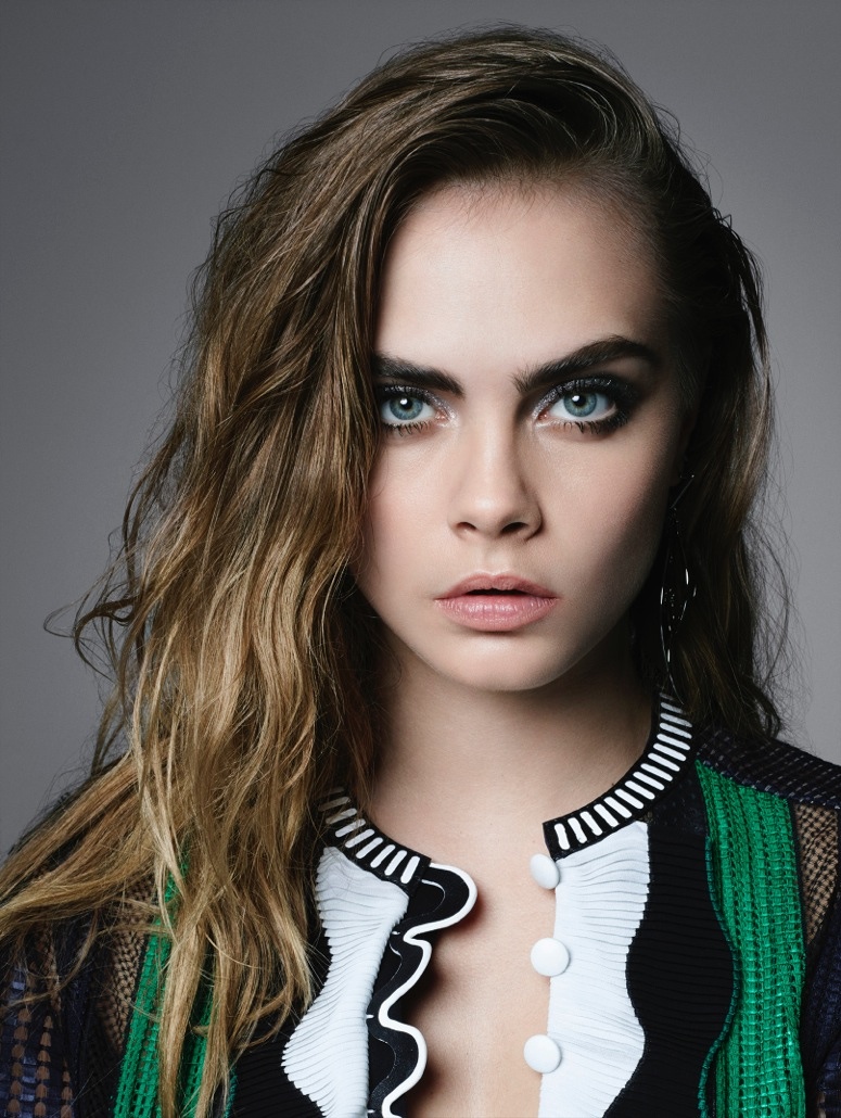 Cara models a dress from Louis Vuitton in this image. 