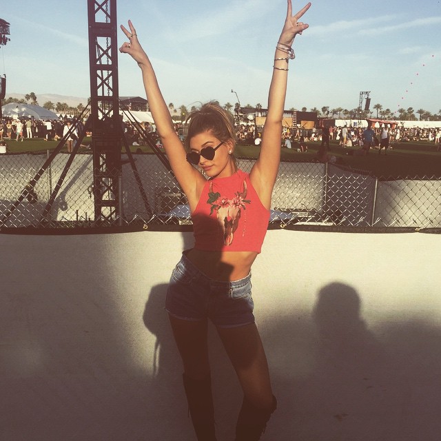 Hailey Baldwin shows off a casual tee with denim shorts. Photo via Instagram
