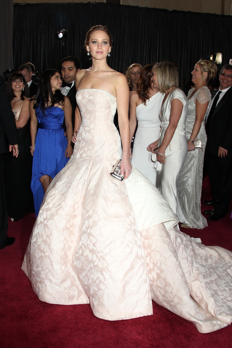 Jennifer Lawrence wore a Dior Haute Couture gown with a full skirt for her 2013 Oscar win for Best Actress, and quickly rose to A-list celebrity status. Helga Esteb / Shutterstock.com