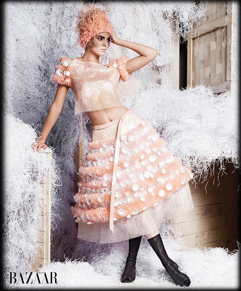 The it model wears Chanel Haute Couture in this image