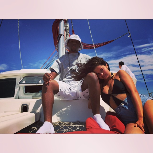 Selena Gomez wears a swimsuit and denim shorts look. Photo via Instagram.