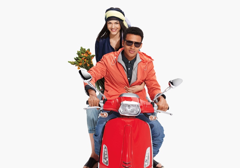 Armani Exchange shows what to wear while riding a vespa for its May lookbook