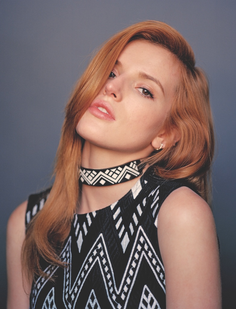 The redhead actress wear a graphic print top from DKNY