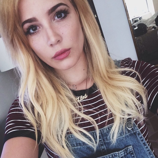 Halsey with long blonde waves