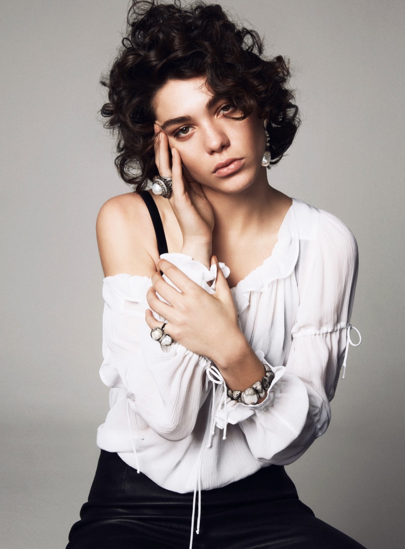 The model wears curly hairstyles in the feature photographed by Andreas Ohlund & Maria Therese