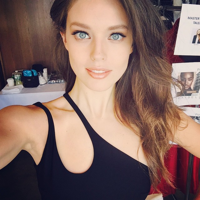 Emily DiDonato shows off a major beauty look on set of Maybelline. Photo via Instagram. 