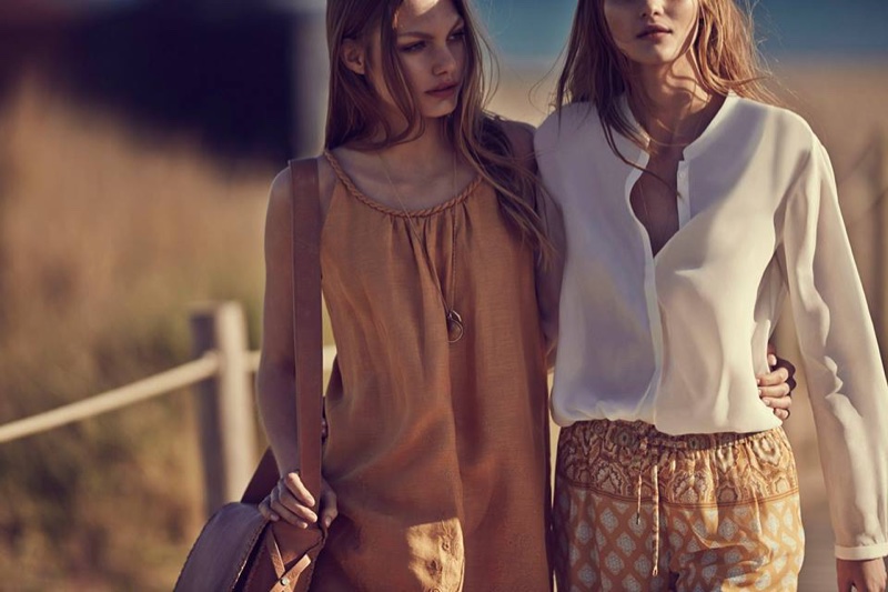 Kate and Annika wear neutral hues in the lookbook