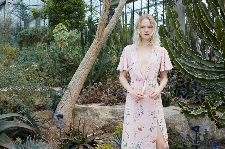 Zara offers this pink dress decorated with floral prints 