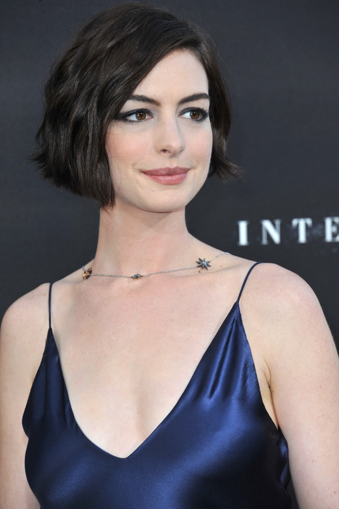 Anne Hathaway grew her hair out into a short bob in 2014. Here she is with an angular cut at the premiere of ‘Interstellar’. Photo: Jaguar PS / Shutterstock.com